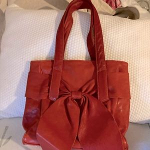 Selling a never been used Susan Farber handbag